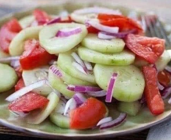 Marinated Cucumbers, Onions, and Tomatoes: A Refreshing Salad to Delight Your Taste Buds