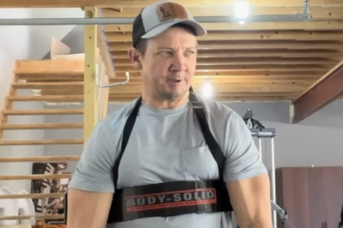 Jeremy Renner Works Out with Large Dumbbells in Basement Gym: ‘Get Better Everyday’