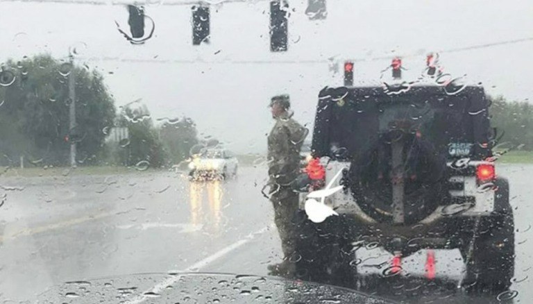 U.S. Soldier Snapped Standing To Attention In The Pouring Rain