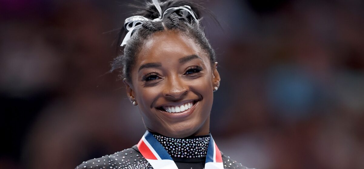 Simone Biles: The Journey from Adversity to Olympian Glory