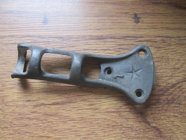 The Vintage Cast Iron Flag Pole Bracket: A Relic of Craftsmanship and Charm