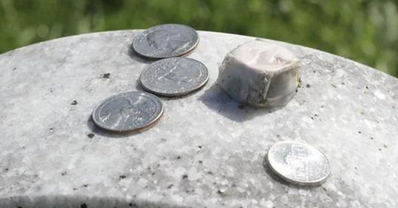 The Reason behind Coins on Gravestones