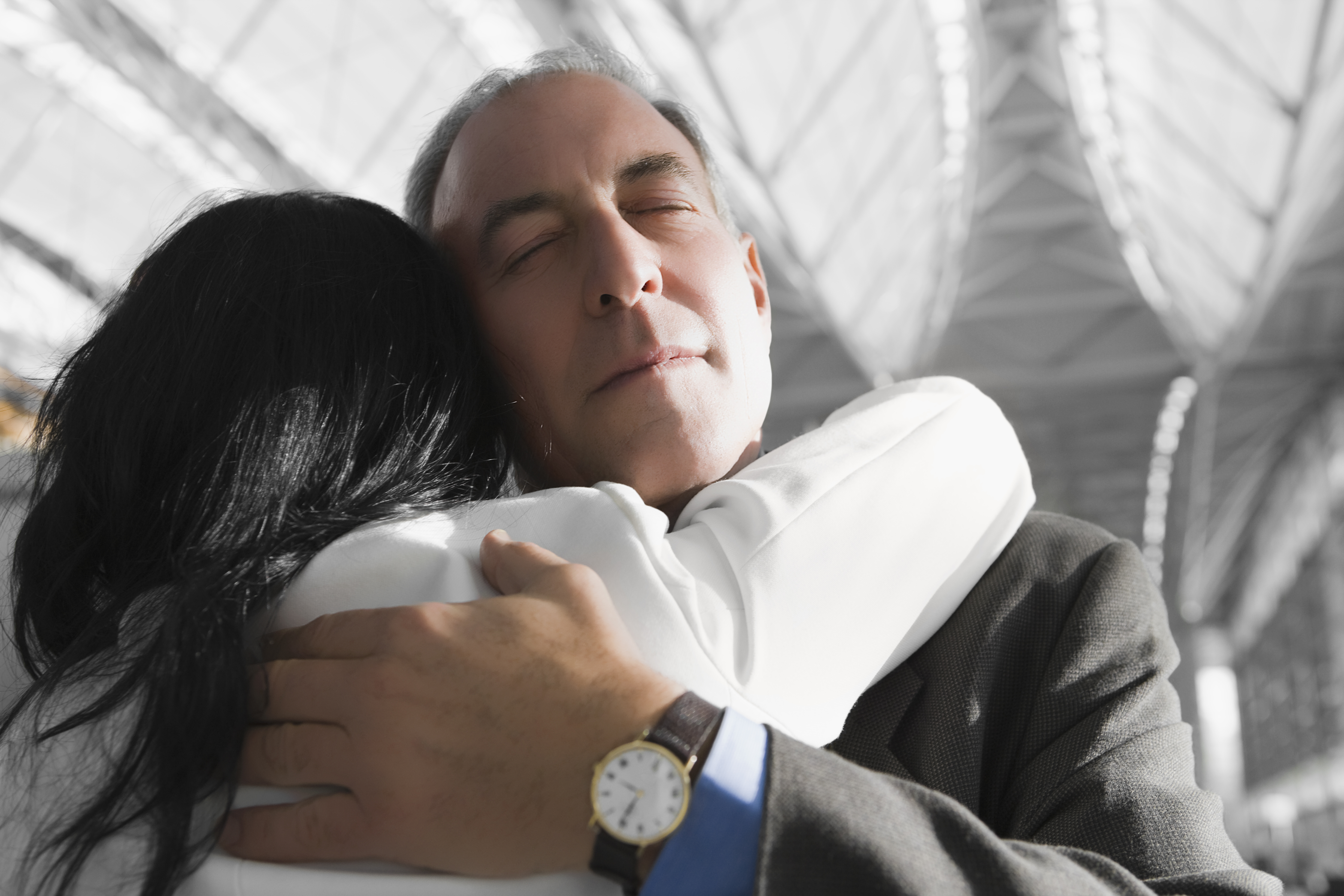 An emotional father hugging his daughter | Source: Getty Images